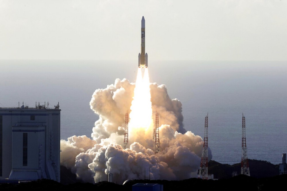 An H-IIA rocket with United Arab Emirates' Mars orbiter Hope lifts off from Tanegashima Space Center in Kagoshima, southern Japan Monday, July 20, 2020. . (Hiroki Yamauchi/Kyodo News via AP)